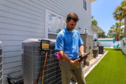 HVAC Maintenance Technician HVAC Tech performing a system Maintenance