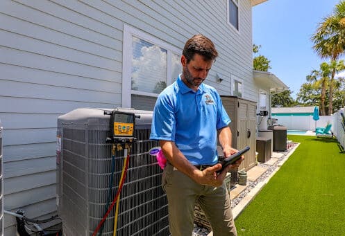 HVAC Tech performing a system Maintenance