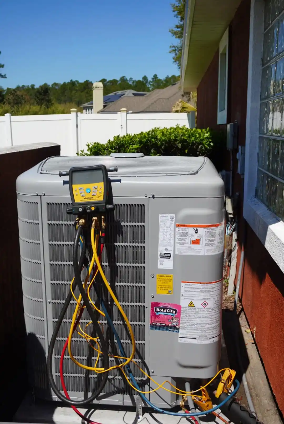 Bold City HVAC technician diagnosing an air conditioner in Jacksonville